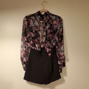 BCBGeneration black backless nightout romper.